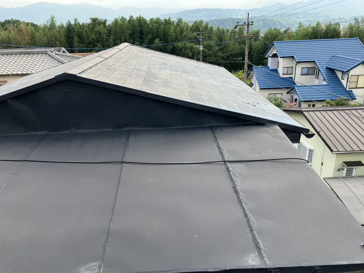 由布市　N様邸　屋根葺き替え板金工事（カラーベスト部カバー工事）/破風板板金巻き